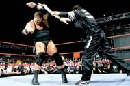 Shane smashes Big Show's skull with a folded steel chair.